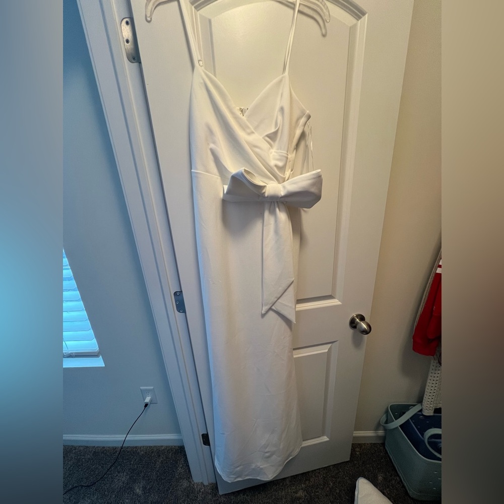 White long formal maxi dress. New with tags from red dress